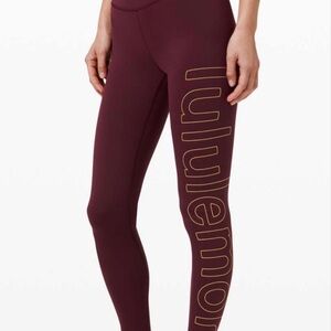 lululemon LUNAR new year Maroon Leggings w/ HUGE logo spellout size 6 small flaw